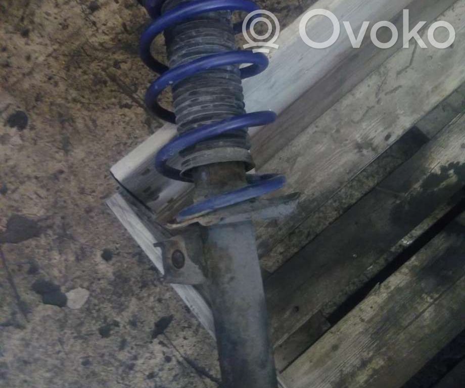 Volkswagen Golf V Amortyzator osi przedniej ze sprężyną 