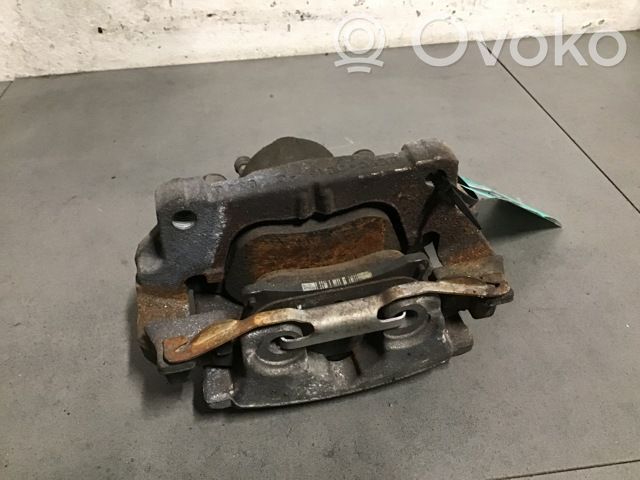 Ford Mondeo MK V Zacisk hamulcowy przedni 