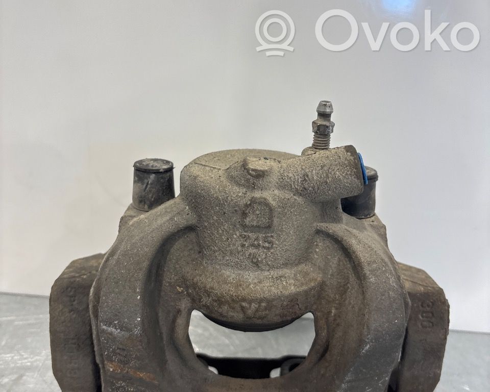 Ford Mondeo MK IV Zacisk hamulcowy przedni 