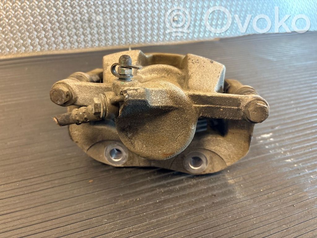 Opel Corsa F Front brake caliper 