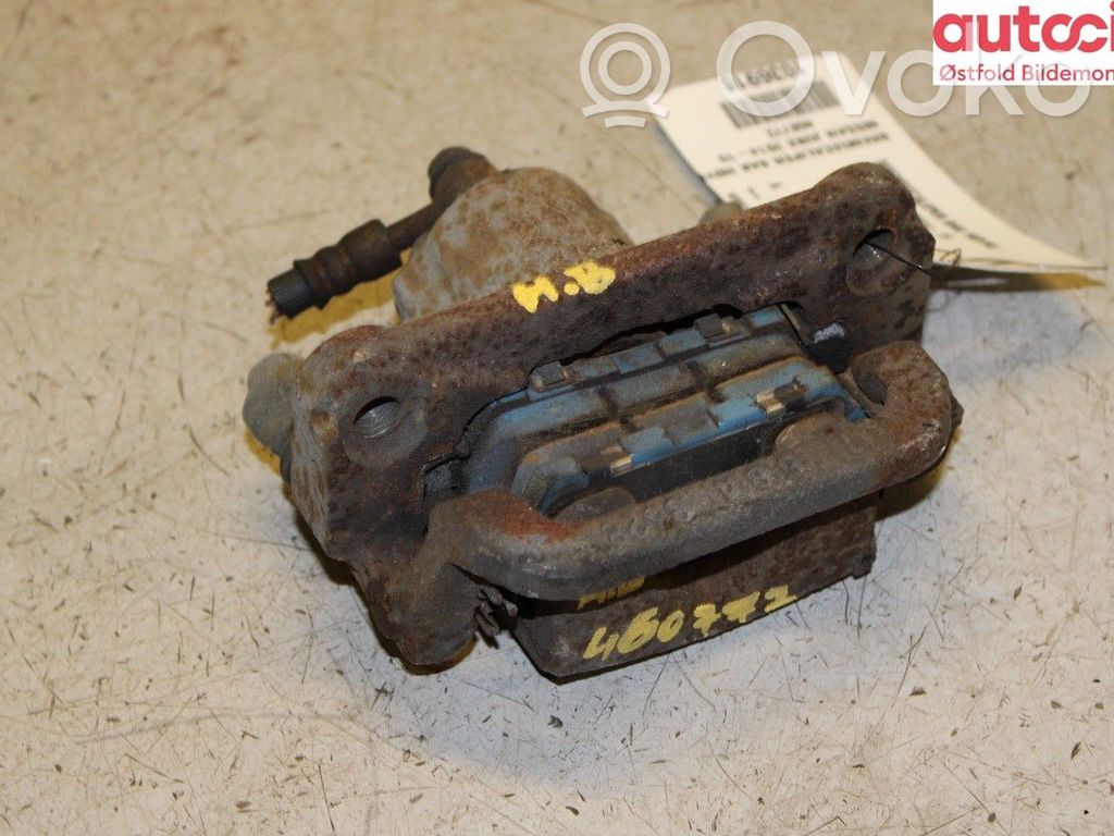 Nissan Juke I F15 Caliper del freno trasero