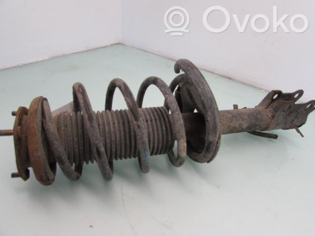 Nissan Almera N16 Ansamblu amortizor cu arc față 