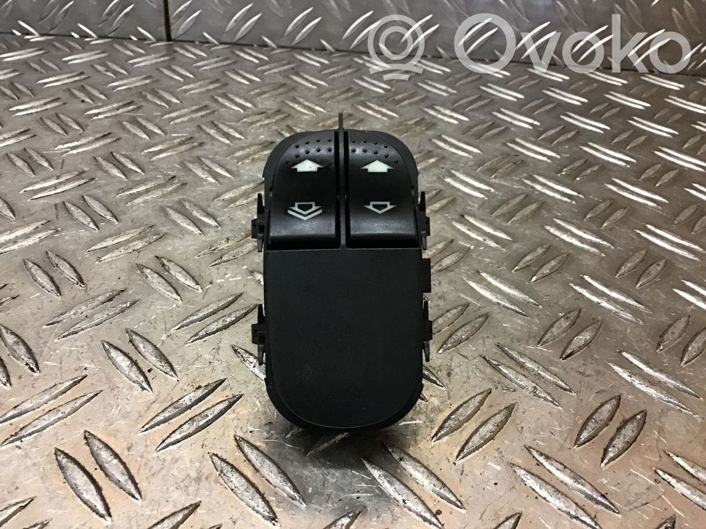 Electric window control switch   YS4T14529AA