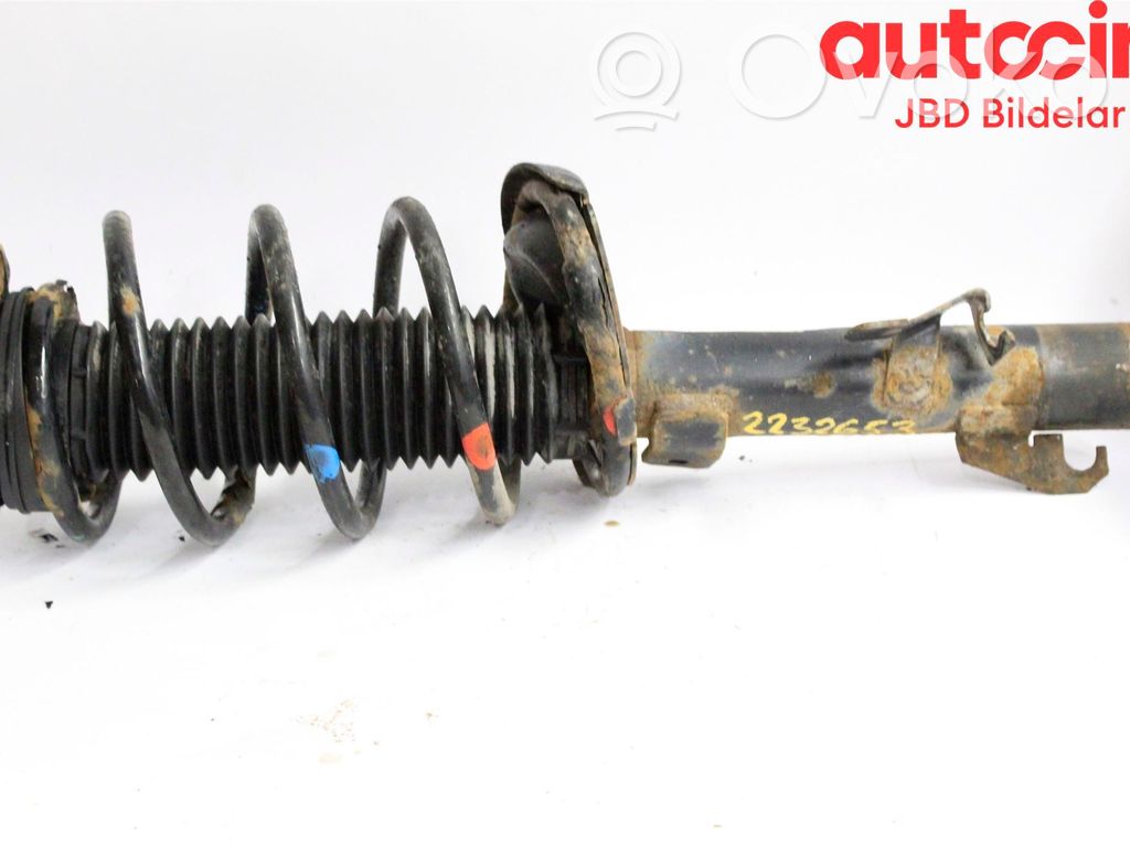 Front shock absorber with coil spring