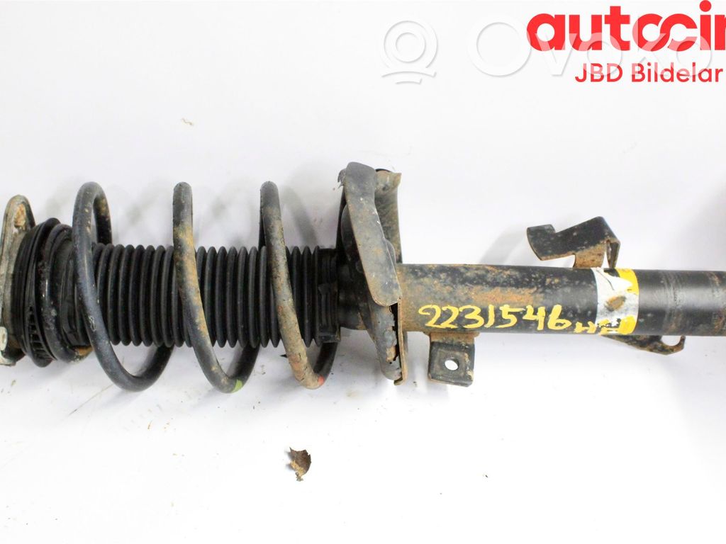 Front shock absorber with coil spring