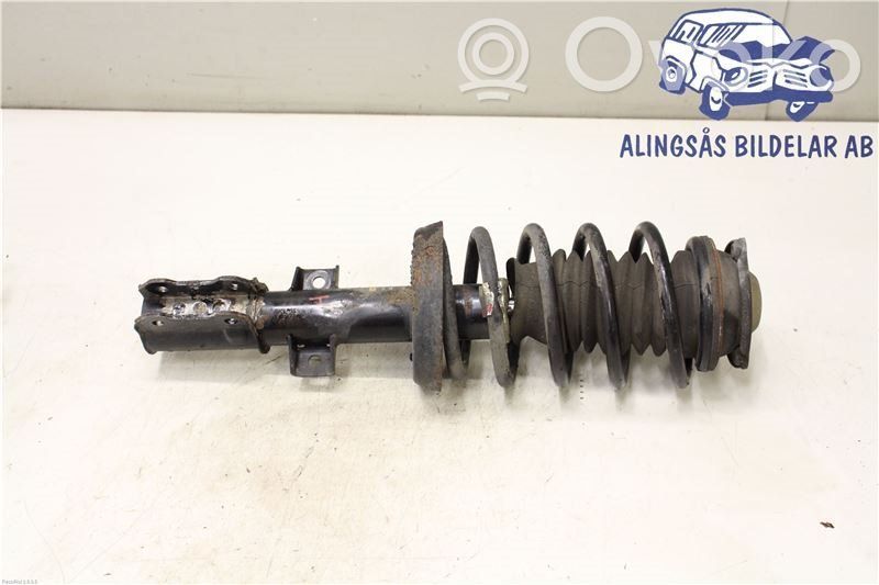 Front shock absorber with coil spring