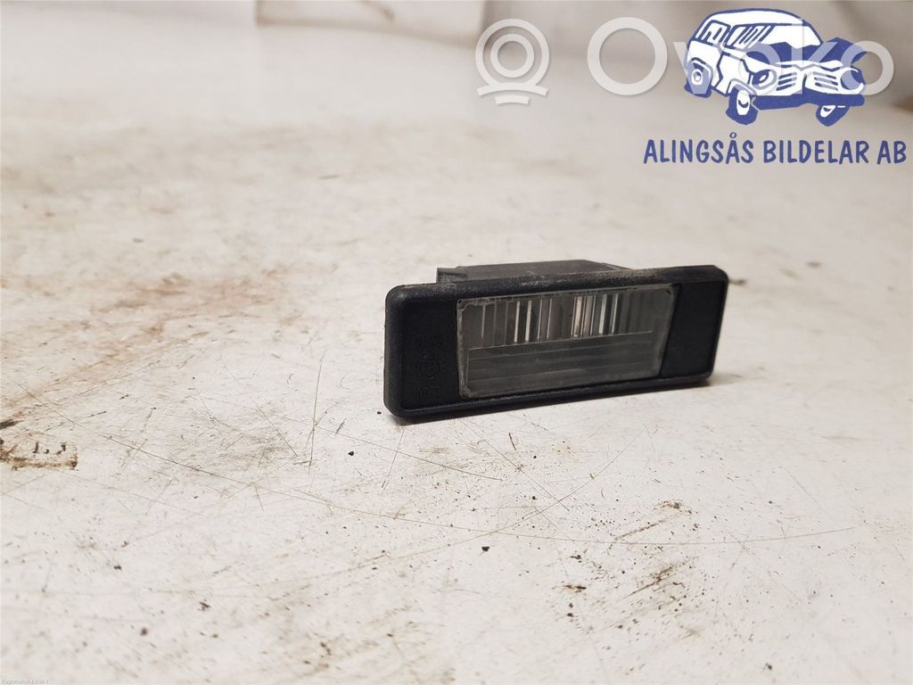 Éclairage de plaque d'immatriculation   26510JD00A