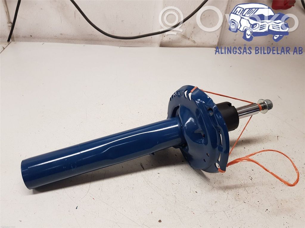 Amortyzator osi przedniej ze sprężyną   5Q0413023HK