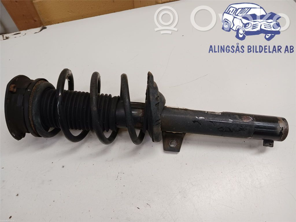 Volkswagen Tiguan Amortyzator osi przedniej ze sprężyną 