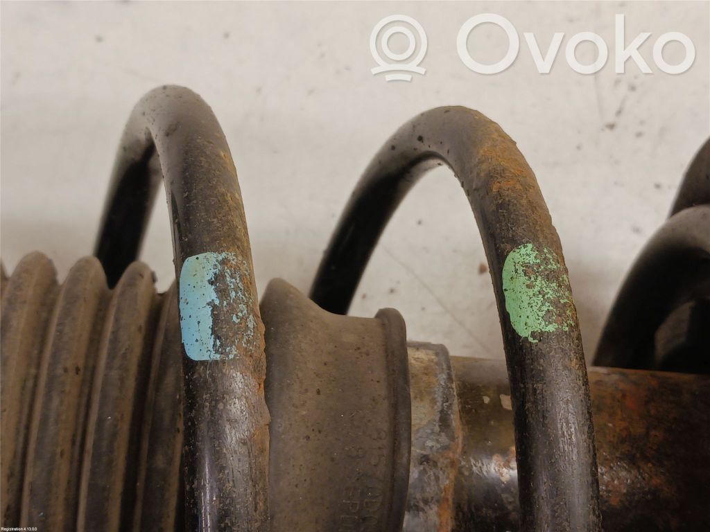 Toyota Yaris Amortyzator osi przedniej ze sprężyną 