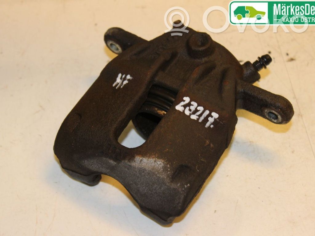 Nissan Note (E11) Zacisk hamulcowy przedni 