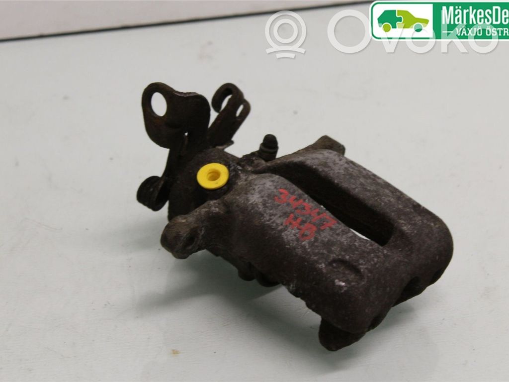 Opel Insignia A Tylny zacisk hamulcowy 