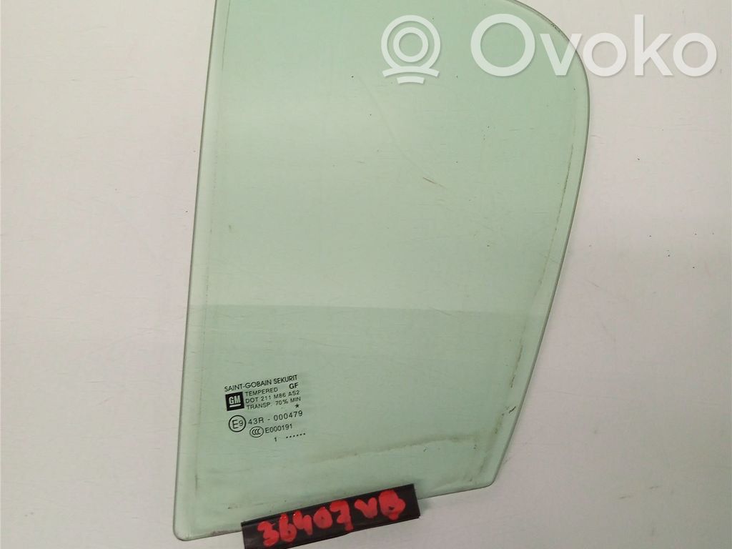 Opel Corsa D Ventanilla de ventilación de la puerta trasera 
