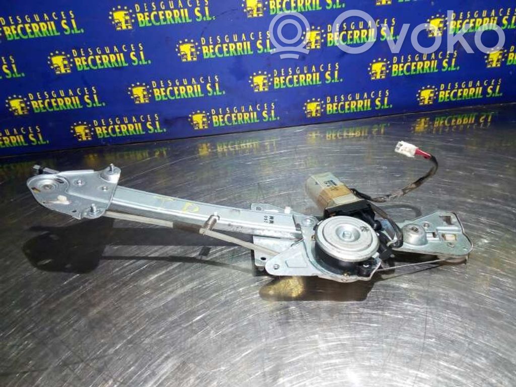Mazda 626 Elektryczny podnośnik szyby drzwi tylnych 