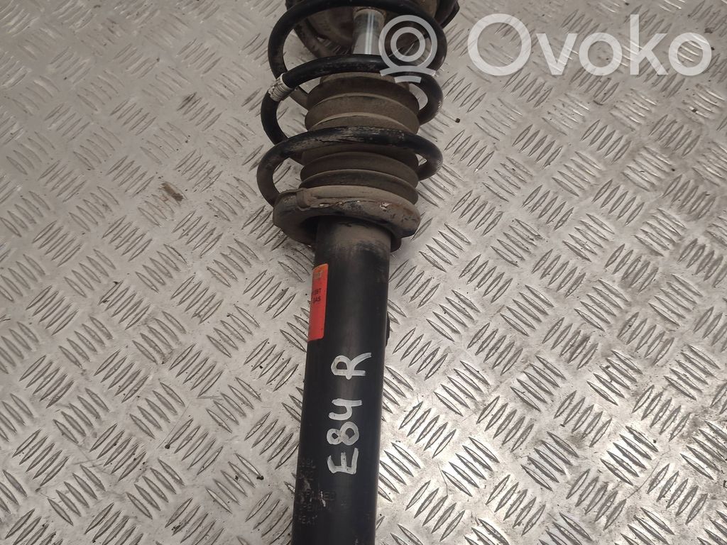 BMW X1 E84 Priekšpusē amortizators 