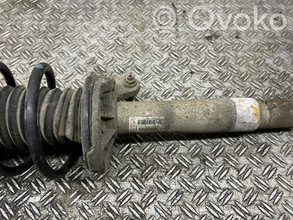 Front shock absorber with coil spring   6758883