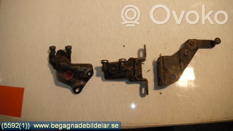 Bisagra superior puerta delantera