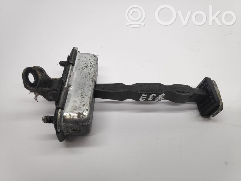 Front door check strap stopper   IGUALDIREITA