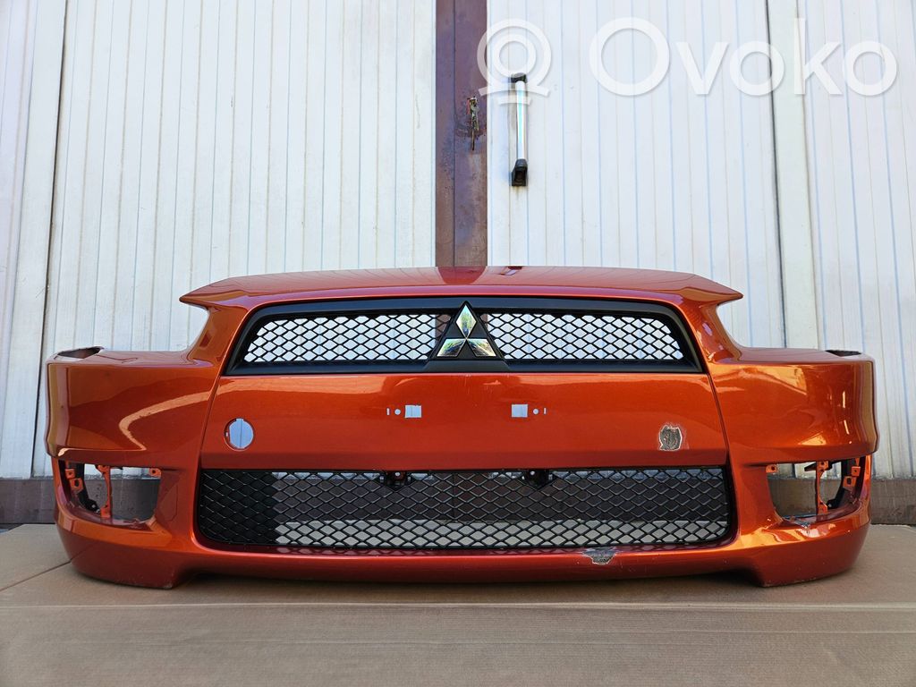 Mitsubishi Lancer VIII Parachoques delantero 