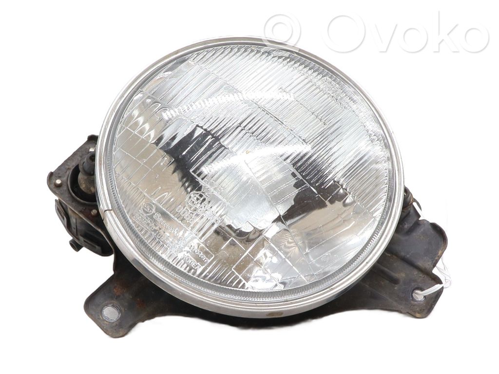 SsangYong Korando Lampa przednia 