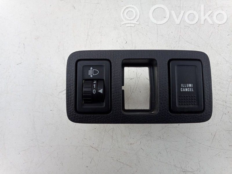 Bouton commande réglage hauteur de phares
