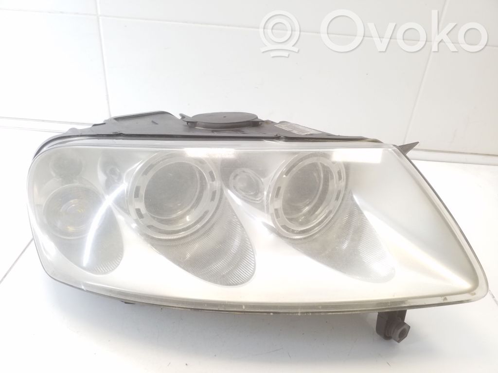 Volkswagen Touareg I Lampa przednia 