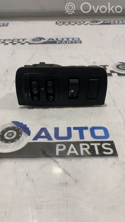 Renault Megane III Interruptor de control de altura del faro delantero 