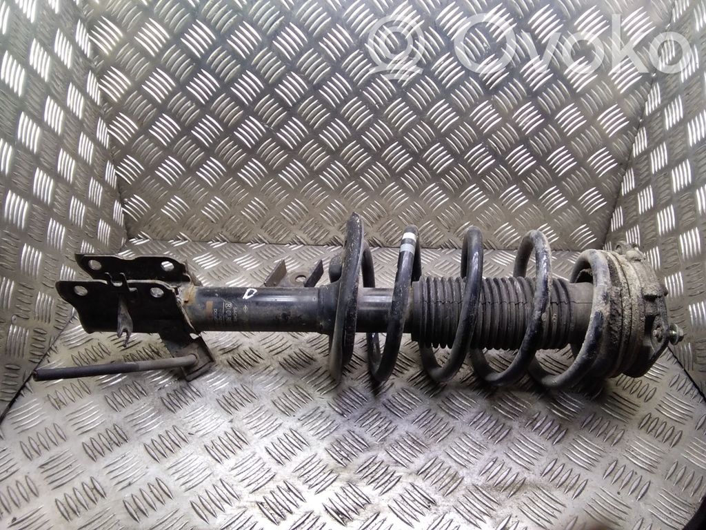 Nissan Qashqai+2 Amortyzator osi przedniej ze sprężyną 