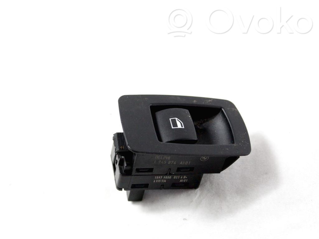 Electric window control switch   6935534