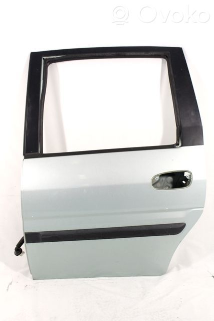 Puerta trasera   7700317020