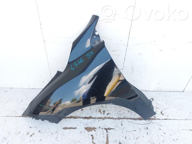 Renault Megane III Rivestimento del pannello parte angolare del paraurti anteriore