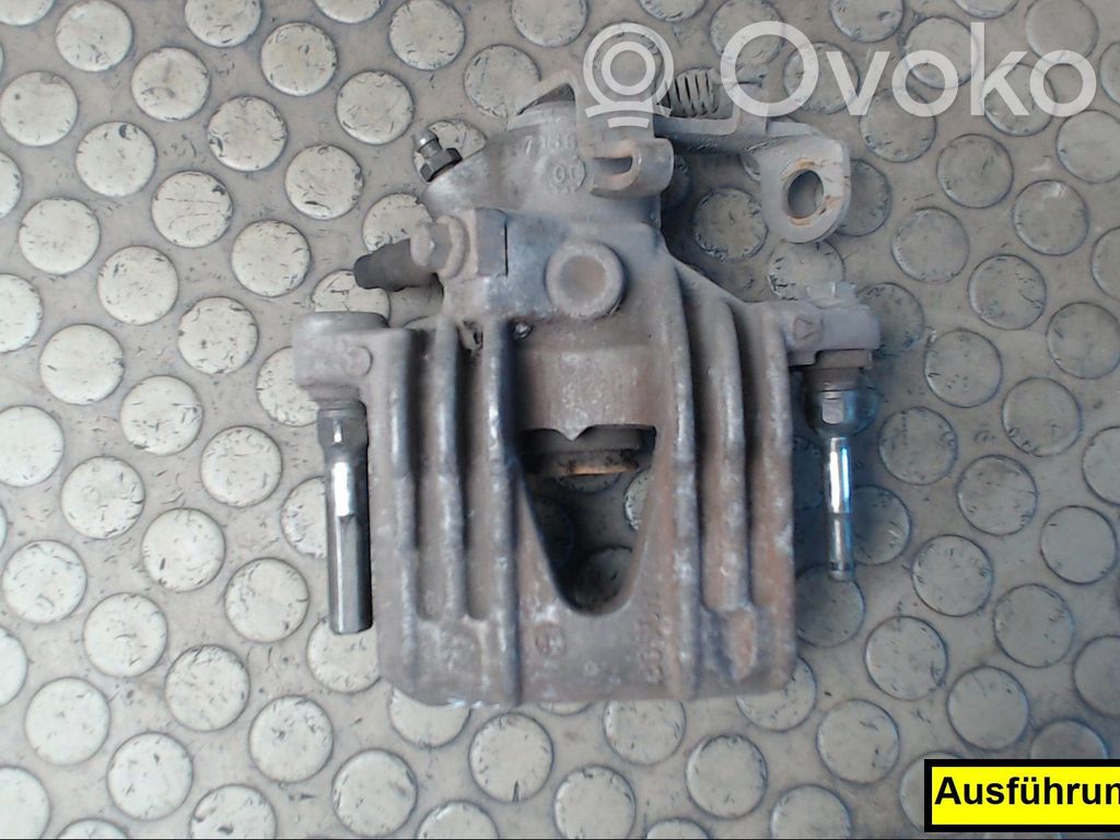 Opel Astra G Tylny zacisk hamulcowy 