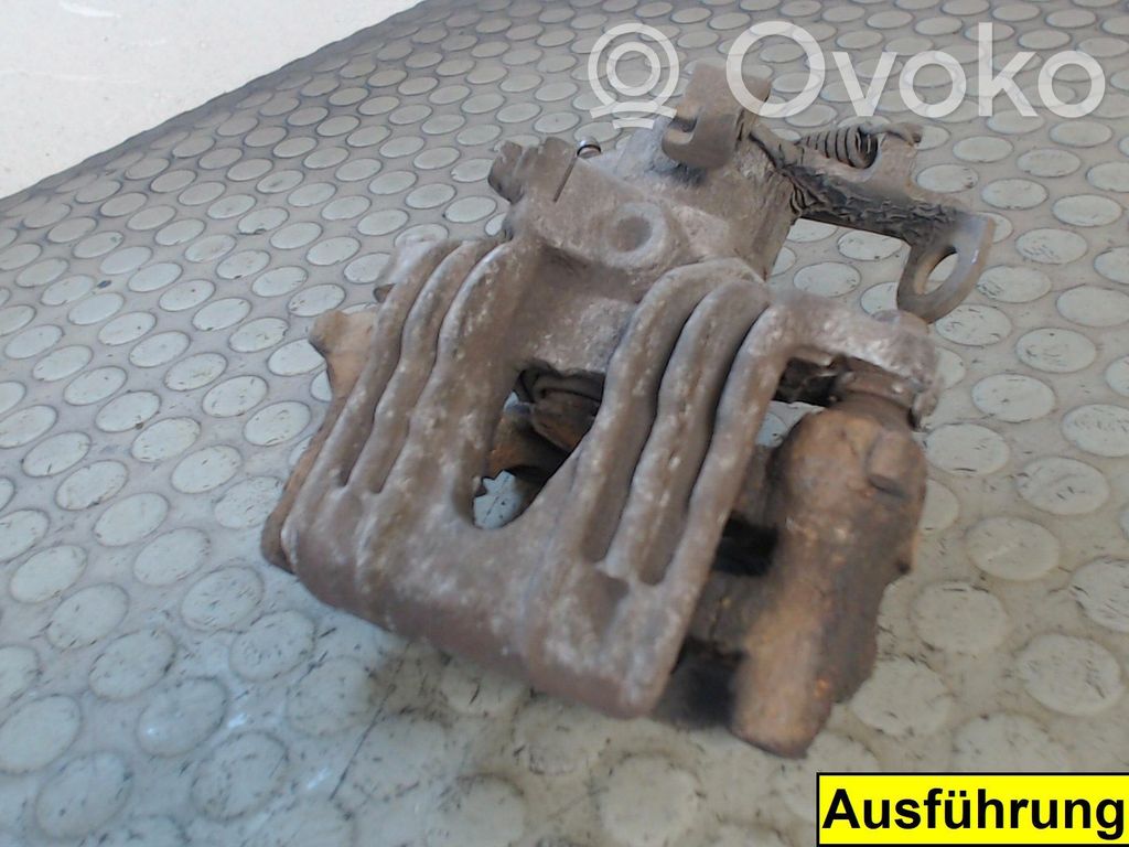 Opel Astra G Tylny zacisk hamulcowy 