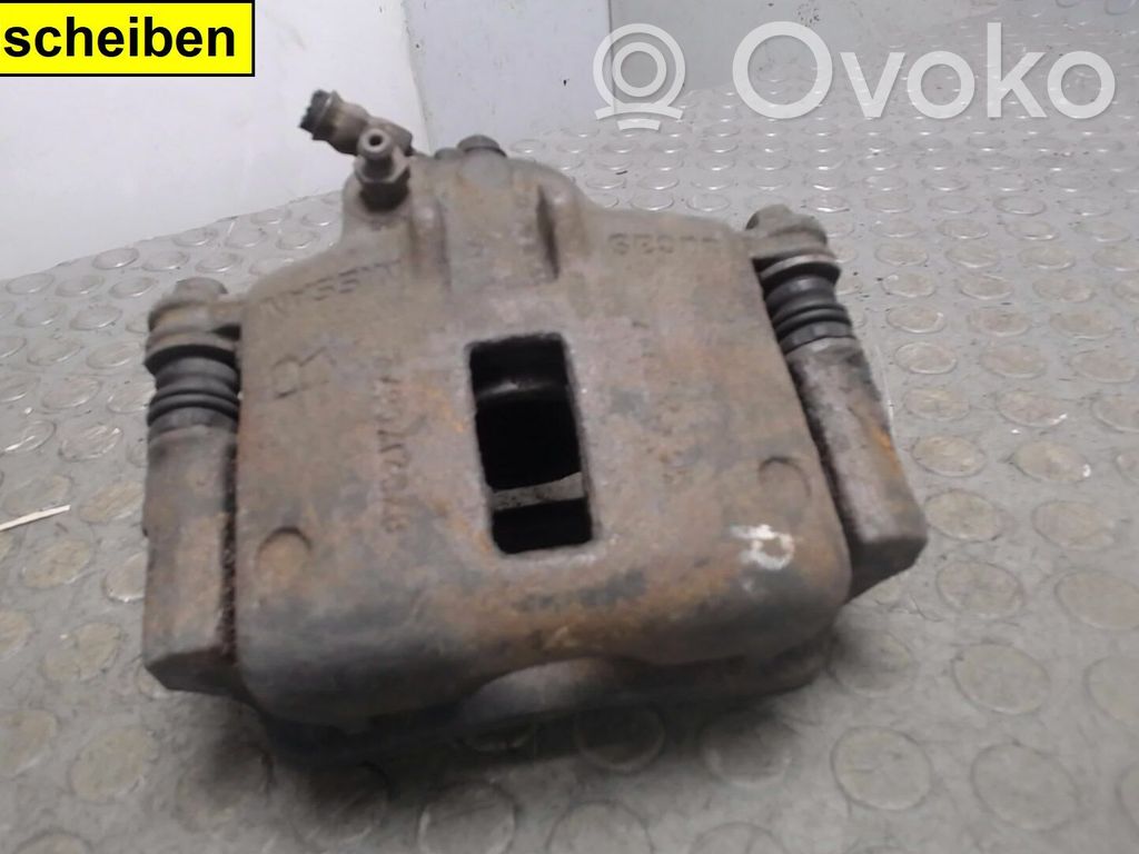 Nissan Micra Передний суппорт 