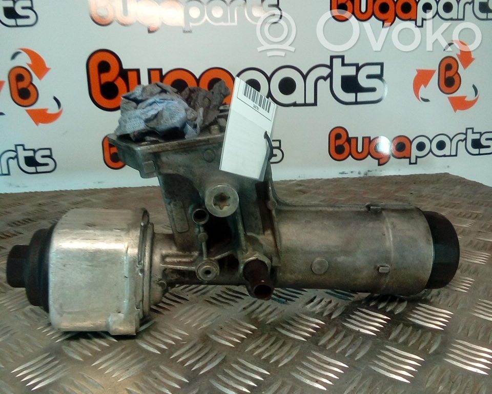 Oil filter mounting bracket   038115389B