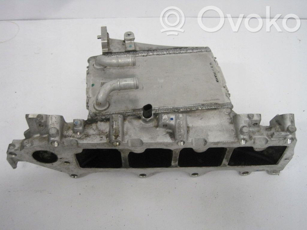 Kolektor ssący   04L129766P