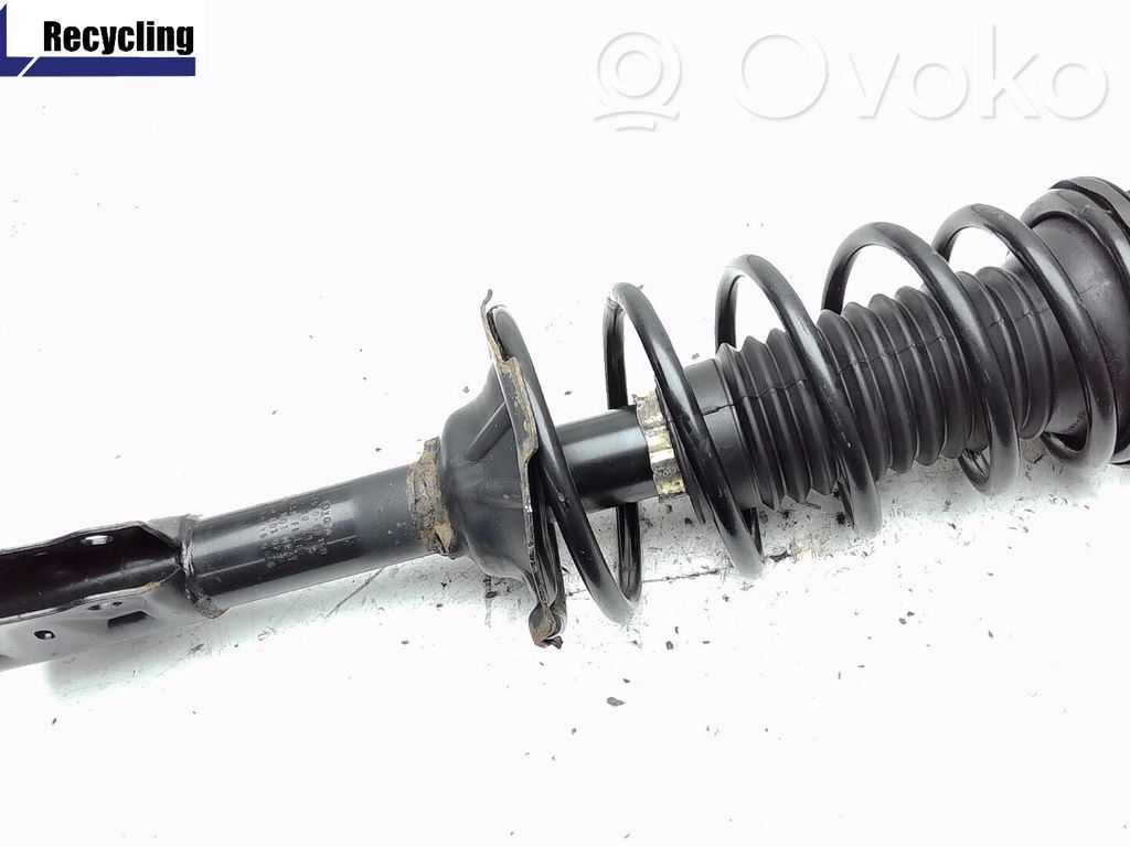 Toyota Yaris Amortyzator osi przedniej ze sprężyną 