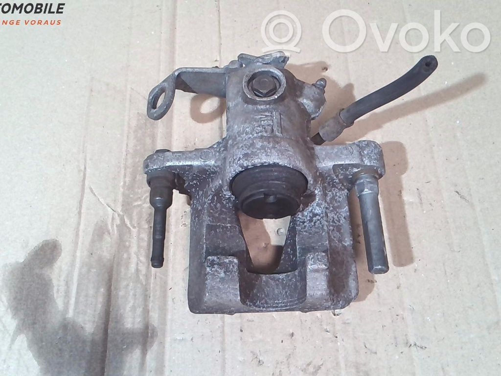 Opel Astra G Tylny zacisk hamulcowy 
