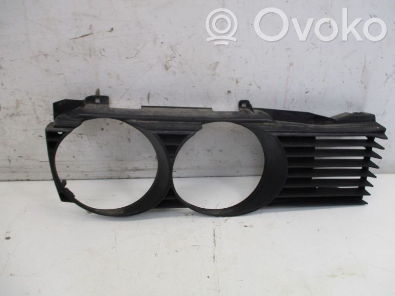Under headlight/headlamp trim   1938426,1938426
