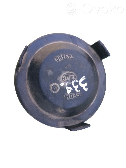 Cache-poussière de phare avant