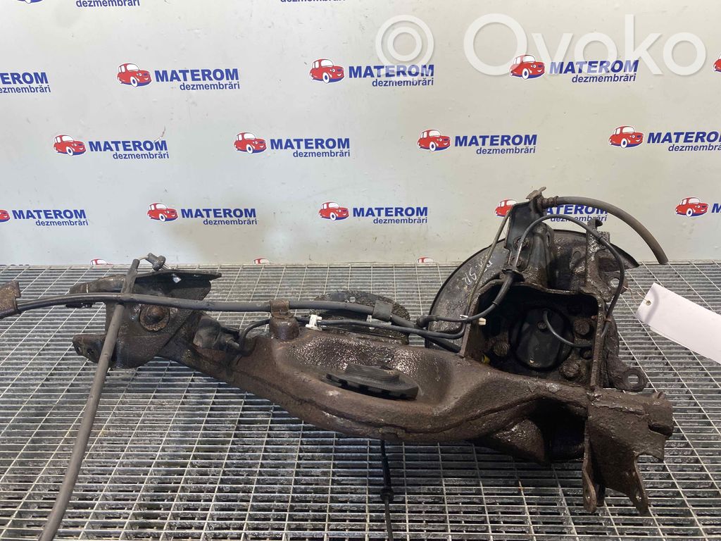 Nissan Qashqai+2 Mangueta de dirección de rueda trasera 
