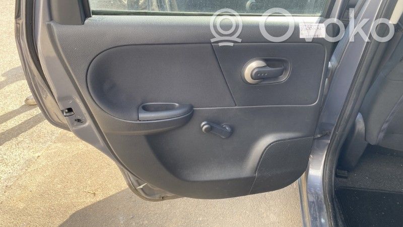 Nissan Note (E11) Apmušimas galinių durų (obšifke) 