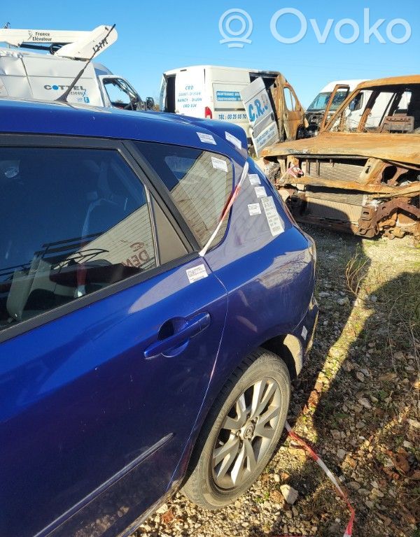 Mazda 3 I Takakulmapaneeli 