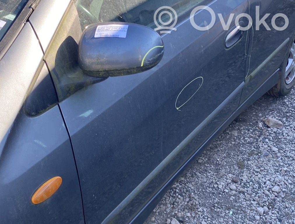 Nissan Almera Tino Drzwi przednie 
