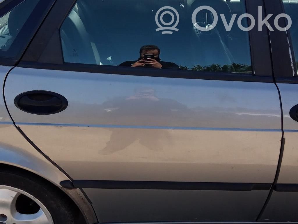 Saab 9-3 Ver1 Elektryczny podnośnik szyby drzwi tylnych 