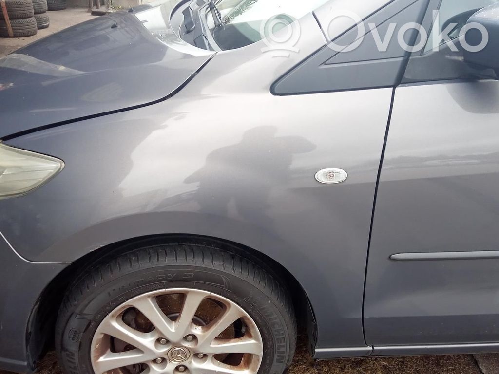 Mazda 5 Крыло 
