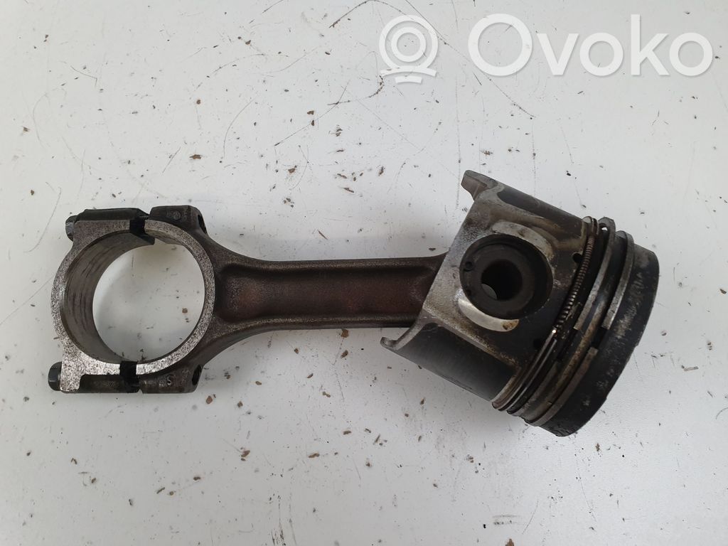 Piston with connecting rod