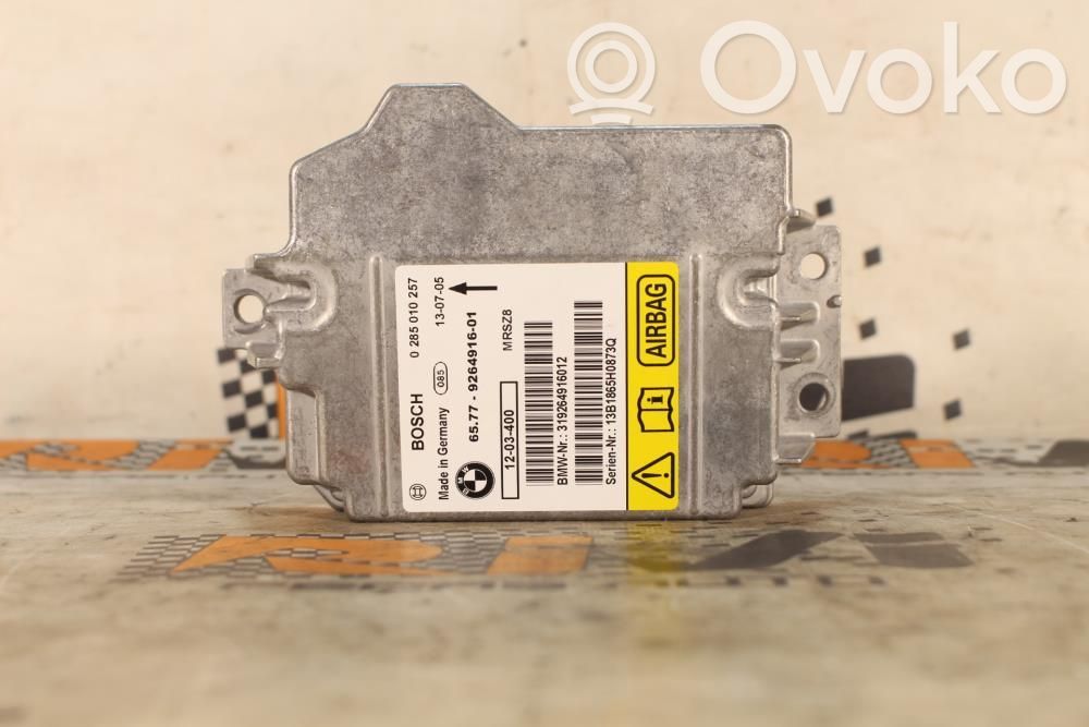Sterownik / Moduł Airbag   65779264916,0285010257,9264916,SERIE1E82E88,SERIE3E92E93