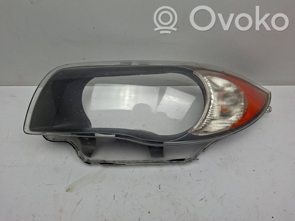 Priekinio žibinto stiklas   6952603