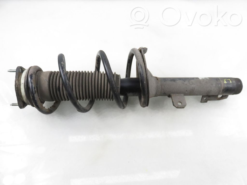 Front shock absorber with coil spring